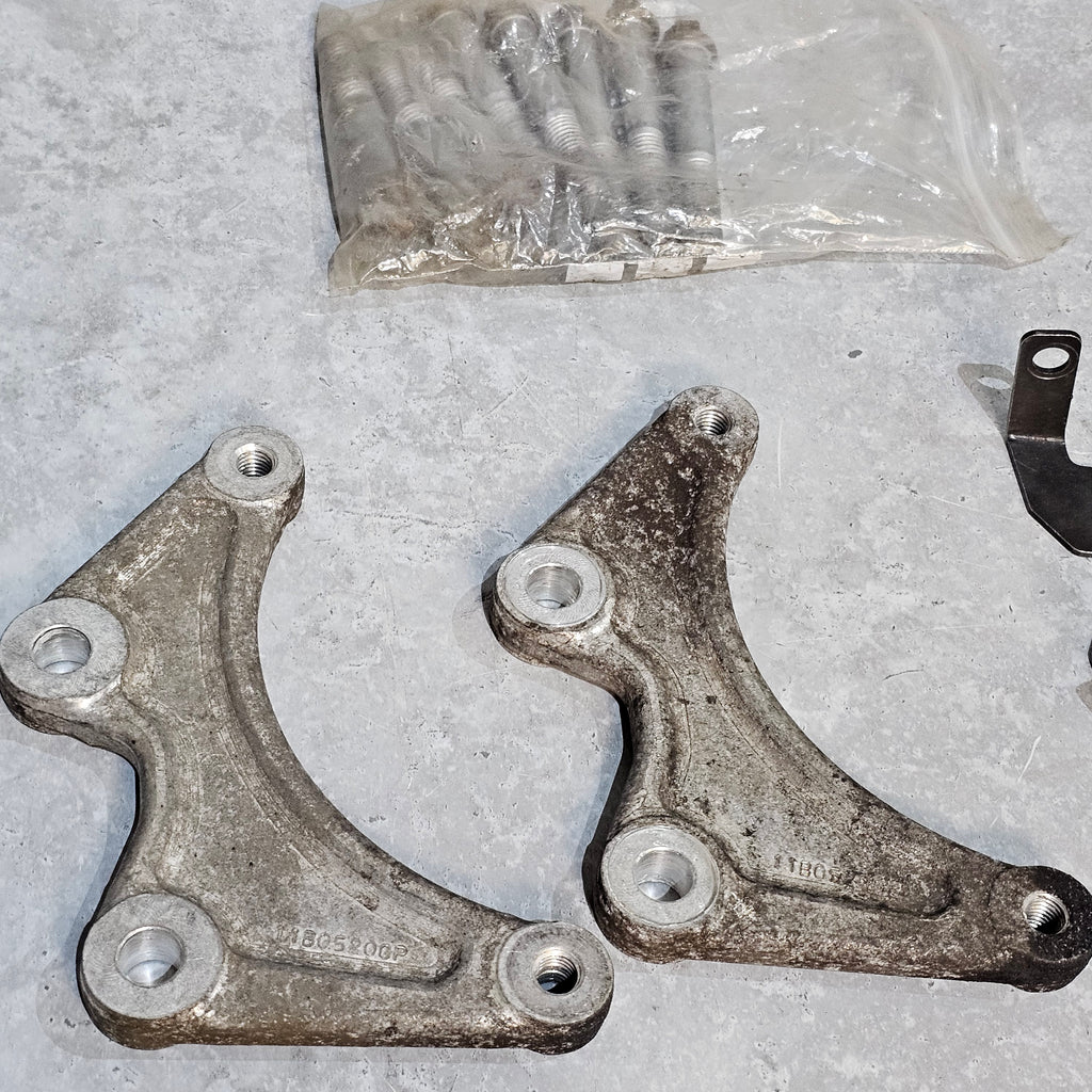 MCLAREN HAND BRAKE ADAPTER BRACKET 11B0520CP (USED)
