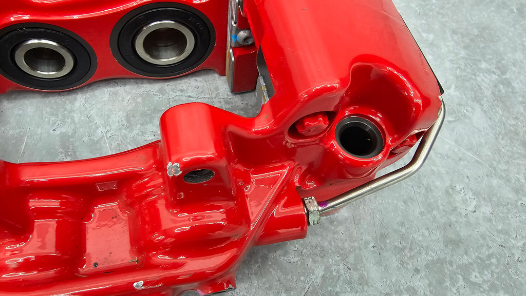 MCLAREN 720S REAR LEFT 4-POT CERAMIC CALIPER (RED) 14CA064CP