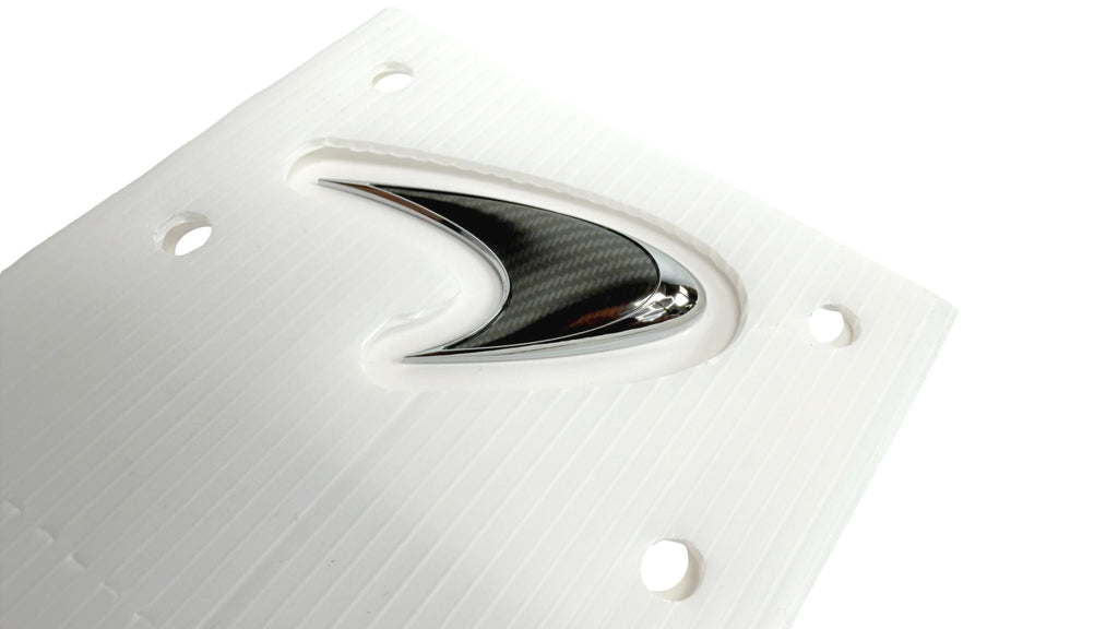 MCLAREN P1  CARBON FIBRE BONNET BADGE 12A9388CP