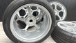 Load image into Gallery viewer, LAMBORGHINI URUS 22" PERFORMANTE LIGHT WEIGHT WHEEL AND TYRES SET SILVER 4ML601025