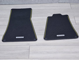 MCLAREN ARTURA MSO BLACK/ YELLOW FLOOR MATTS (LHD) 16NC281CP-0057