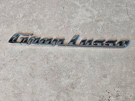 MASERATI LH GRANLUSSO LATERAL EMBLEM 670102611