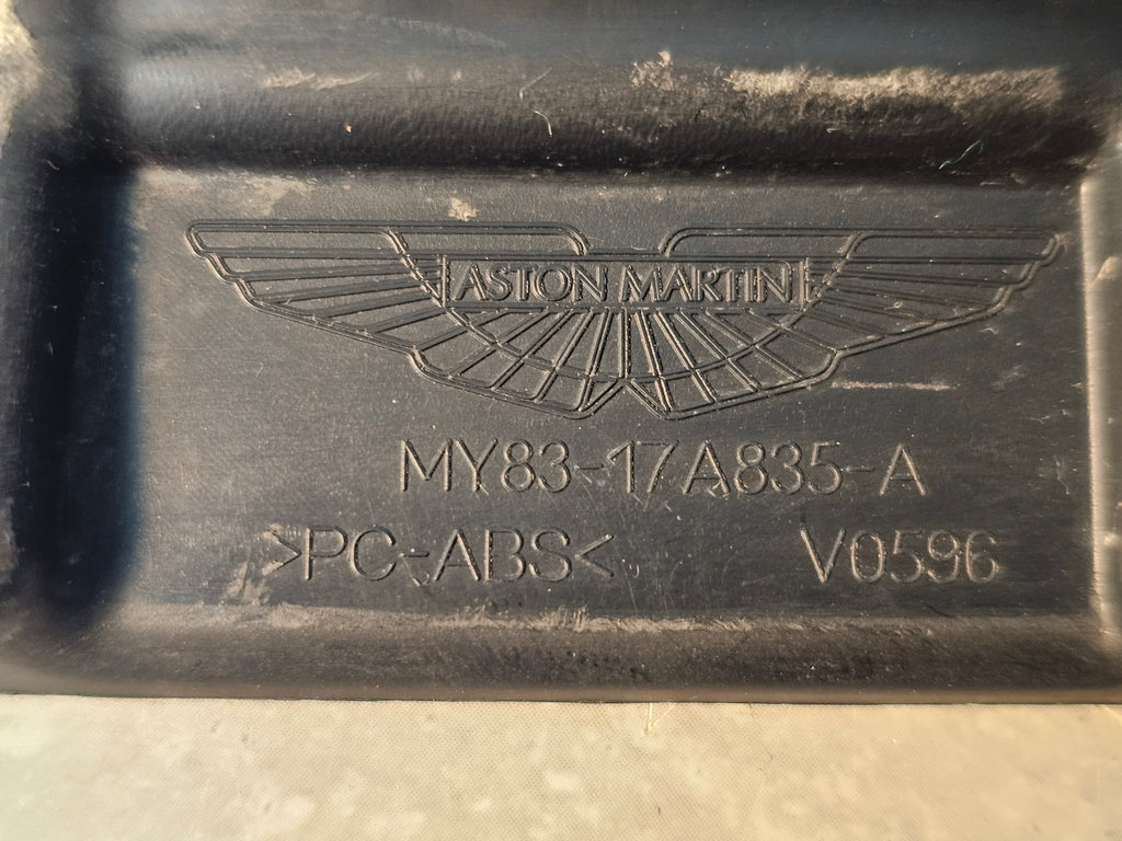 DBX ROW FRONT NUMBER PLATE PLINTH (UP TO 2023)  MY83-17A835-A